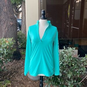 Woman’s- Nike dri-fit, long sleeve, turquoise top in size XL